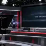 Halk TV kayyum haberi için yapay zekâ ile oluşturulmuş temsili televizyon haber stüdyosu.